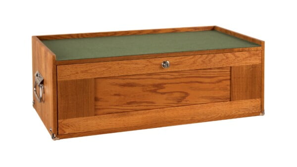 Wooden storage chest with metal handles on white background.