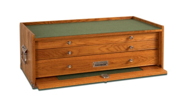 Wooden toolbox with drawers on white background.