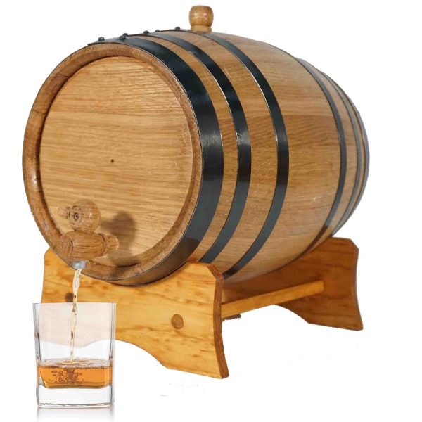 Wooden whiskey barrel dispensing into glass.